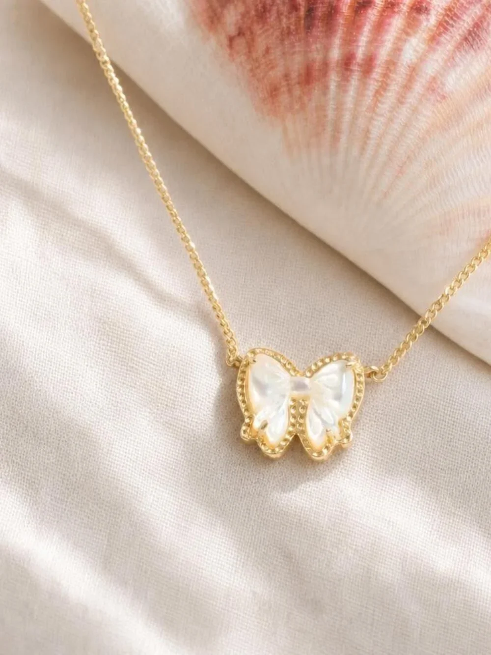 Kendra Scott Haley Bow Gold Ivory Mother-of-Pearl Necklace